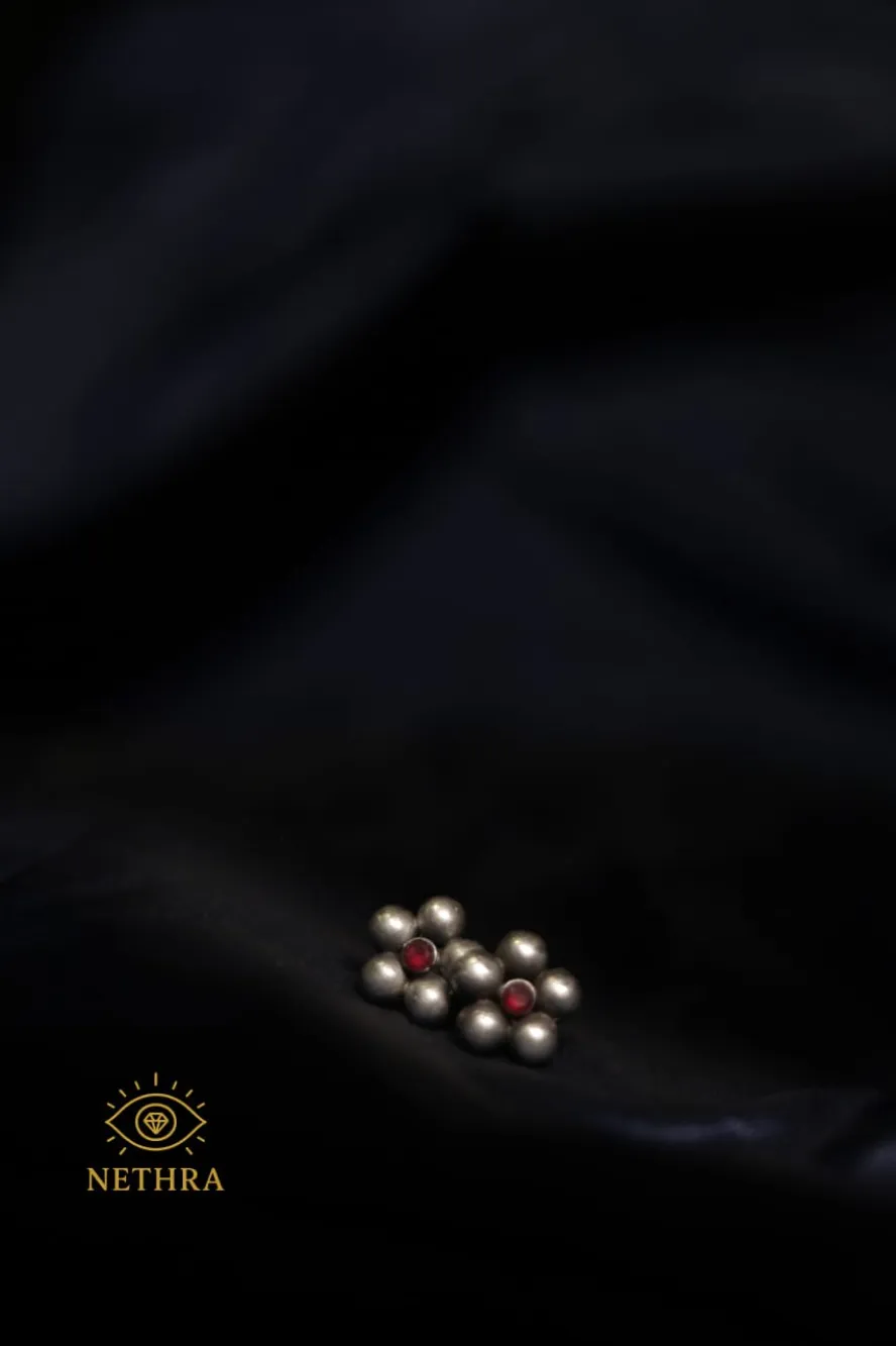 Oxidized Silver Floral Stud Earrings with Red Stone Center