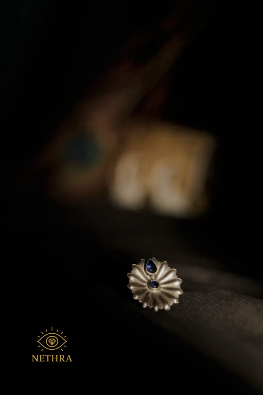 Oxidized Silver Floral Stud Earrings with Blue Stone Accents